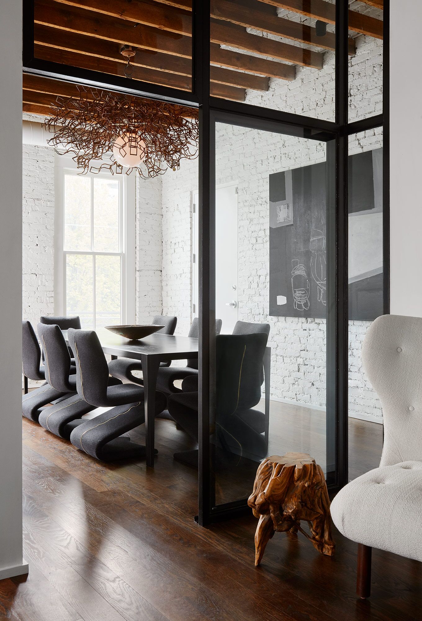 Rustic modern interior design and luxurious minimal modern style in a space by Michael Del Piero. See more Black & White Rustic Modern & Vintage Chic Design Inspo in this story on Hello Lovely.