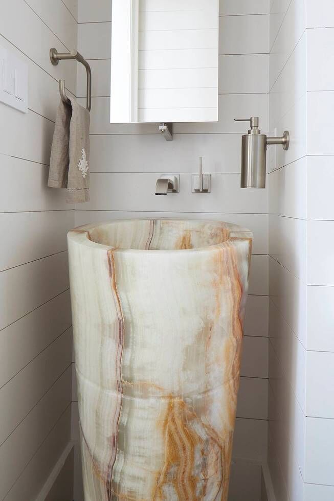 Unique stone sink in bathroom. Stunning interior design and Timeless Architecture Inspiration: Jeffrey Dungan. Photo: William Abranowicz. #classicdesign #traditional #architecture #jeffreydungan #sophisticateddesign #architect