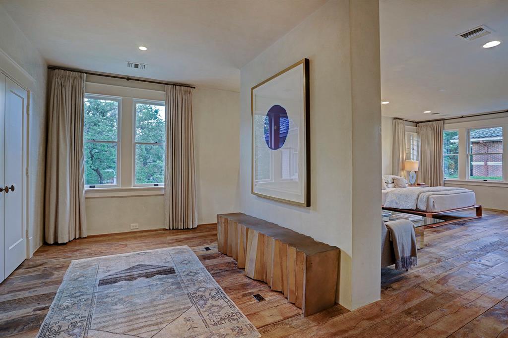 Sophisticated decor in a bedroom. Luxurious interior design details in a Tudor Revival house renovation in Houston. Design consultant: Pam Pierce. Many reclaimed antique materials from Chateau Domingue. #housetour #oldworld #pampierce #chateaudomingue #europeanantiques #luxurioushome #interiordesignideas #Frenchcountry #limestone #reclaimedflooring #bespoke #houstonhome