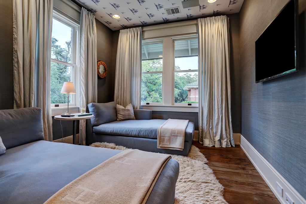 Linen chaise daybeds in sitting room. Luxurious interior design details in a Tudor Revival house renovation in Houston. Design consultant: Pam Pierce. Many reclaimed antique materials from Chateau Domingue. #housetour #oldworld #pampierce #chateaudomingue #europeanantiques #luxurioushome #interiordesignideas #Frenchcountry #limestone #reclaimedflooring #bespoke #houstonhome