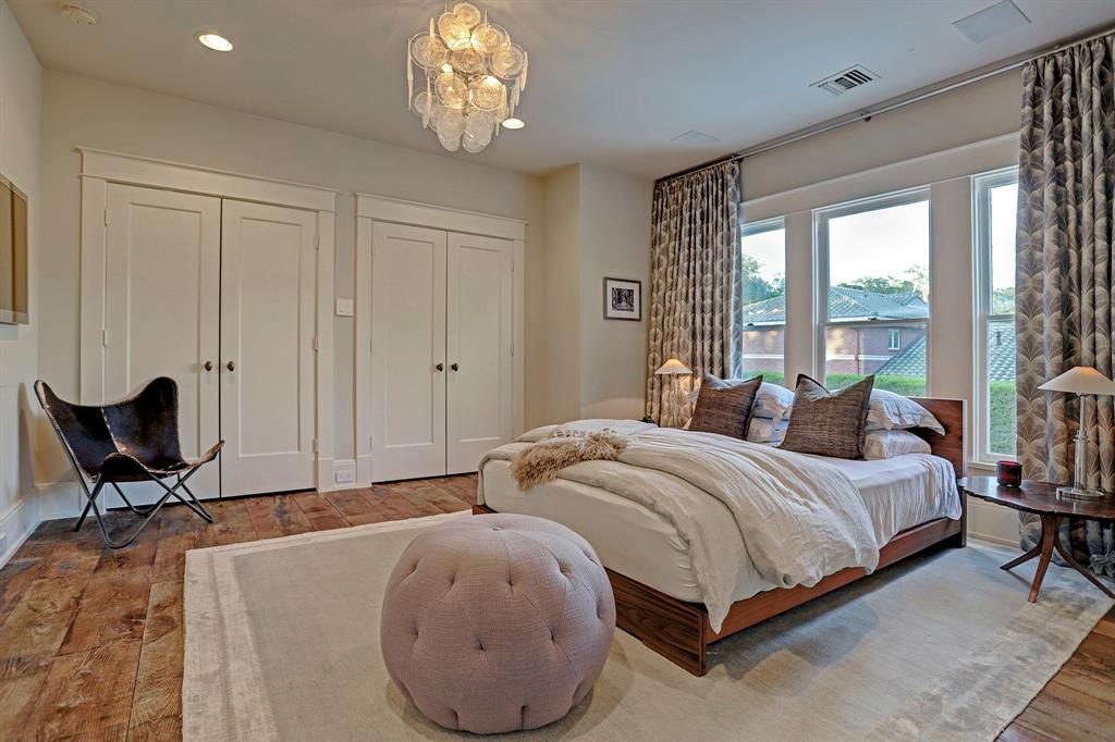 Classic decor in a 1920s bedroom. Luxurious interior design details in a Tudor Revival house renovation in Houston. Design consultant: Pam Pierce. Many reclaimed antique materials from Chateau Domingue. #housetour #oldworld #pampierce #chateaudomingue #europeanantiques #luxurioushome #interiordesignideas #Frenchcountry #limestone #reclaimedflooring #bespoke #houstonhome