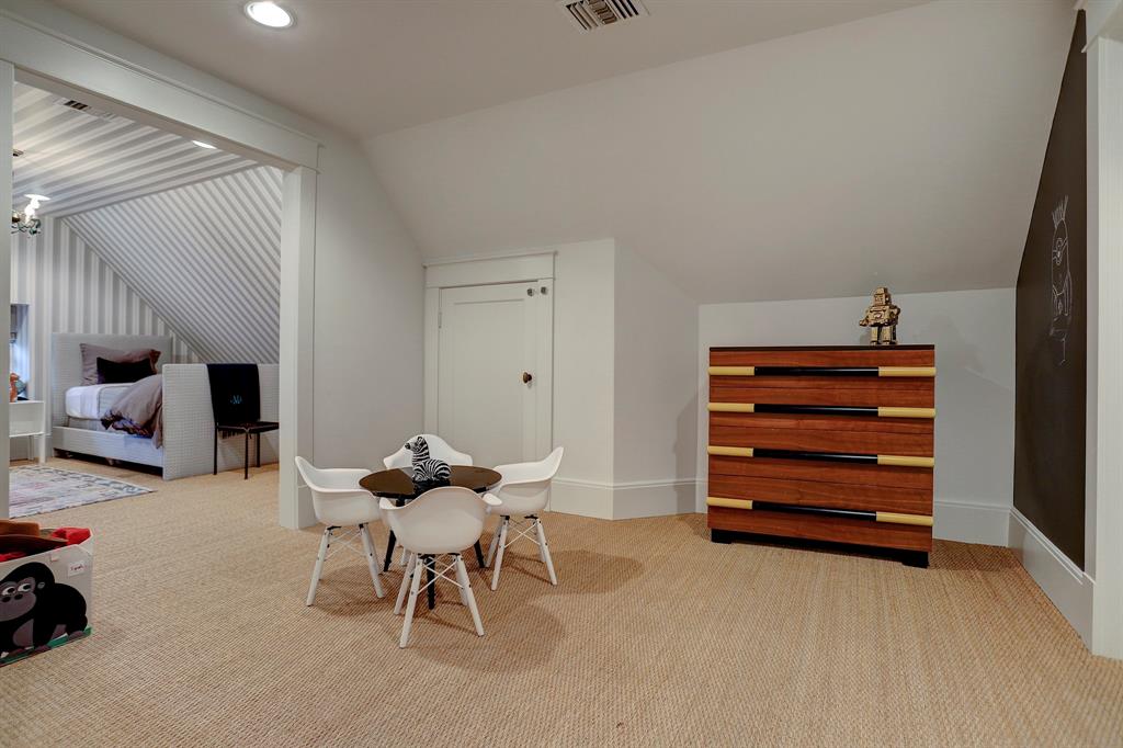 Seagrass carpet in a playroom. Luxurious interior design details in a Tudor Revival house renovation in Houston. Design consultant: Pam Pierce. Many reclaimed antique materials from Chateau Domingue. #housetour #oldworld #pampierce #chateaudomingue #europeanantiques #luxurioushome #interiordesignideas #Frenchcountry #limestone #reclaimedflooring #bespoke #houstonhome