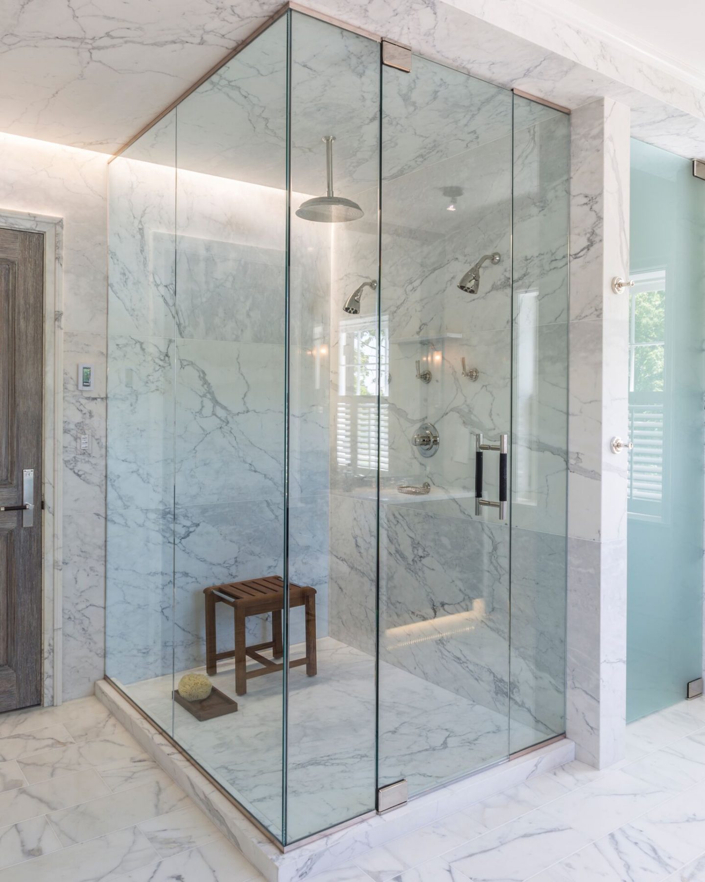 Luxurious marble shower. Classic and timeless interior design by Patrick Sutton. #patricksutton #interiordesign #luxury #timelessdesign