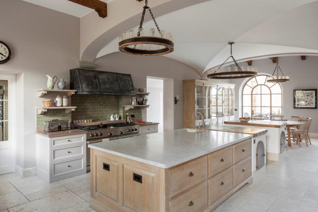 Tuscan villa kitchen with luxurious bespoke kitchen renovation by Artichoke.