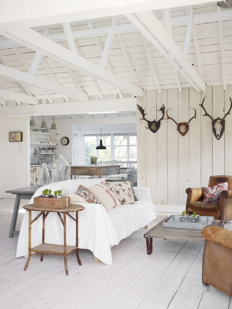 White Rustic Coastal Cottage Decorating Charm in a beautiful home in East Sussex by The Beach Studios (Atlanta Bartlett & Dave Coote). #shabbychic #whitedecor #housetour #cottagestyle #interiordesign #rusticdecor