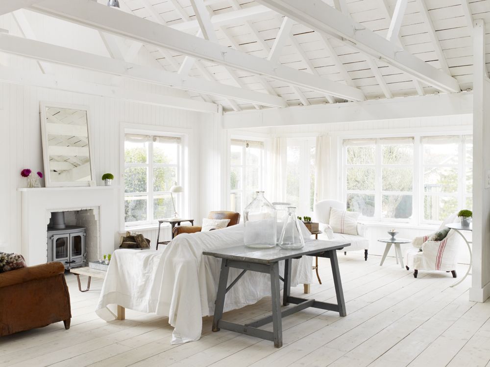 White Rustic Coastal Cottage Decorating Charm in a beautiful home in East Sussex by The Beach Studios (Atlanta Bartlett & Dave Coote). #shabbychic #whitedecor #housetour #cottagestyle #interiordesign #rusticdecor