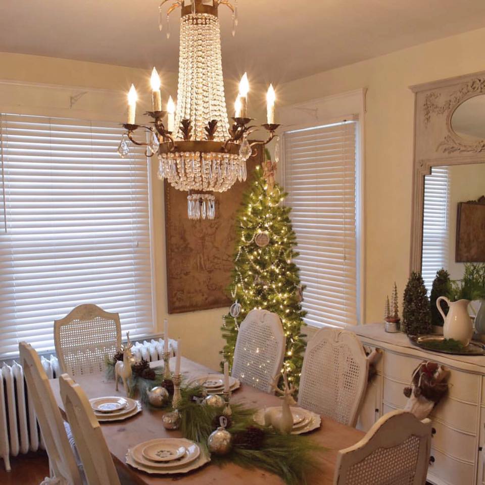 French country Christmas dining room with empire crystal chandelier and European inspired charm. Corner French Cottage. #christmasdecor #shabbychic #frenchfarmhouse #frenchcottage