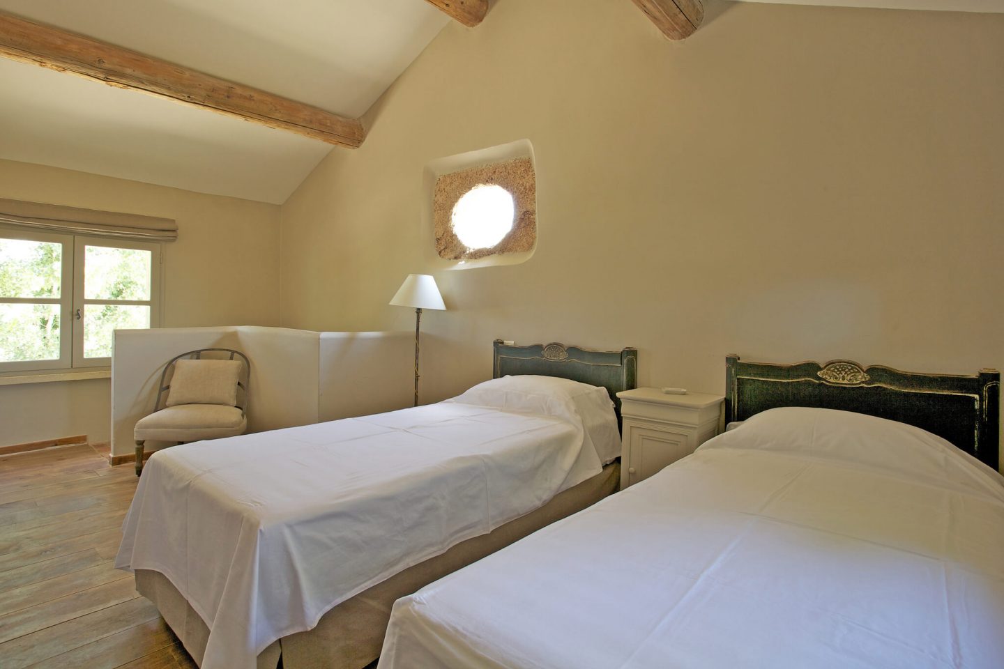 Come discover rustic elegance, ancient stone, and beautiful rugged beams within a Provencal villa - then stay for the paint color and decor Ideas! #frenchcountry #oldworld #interiordesign #provence