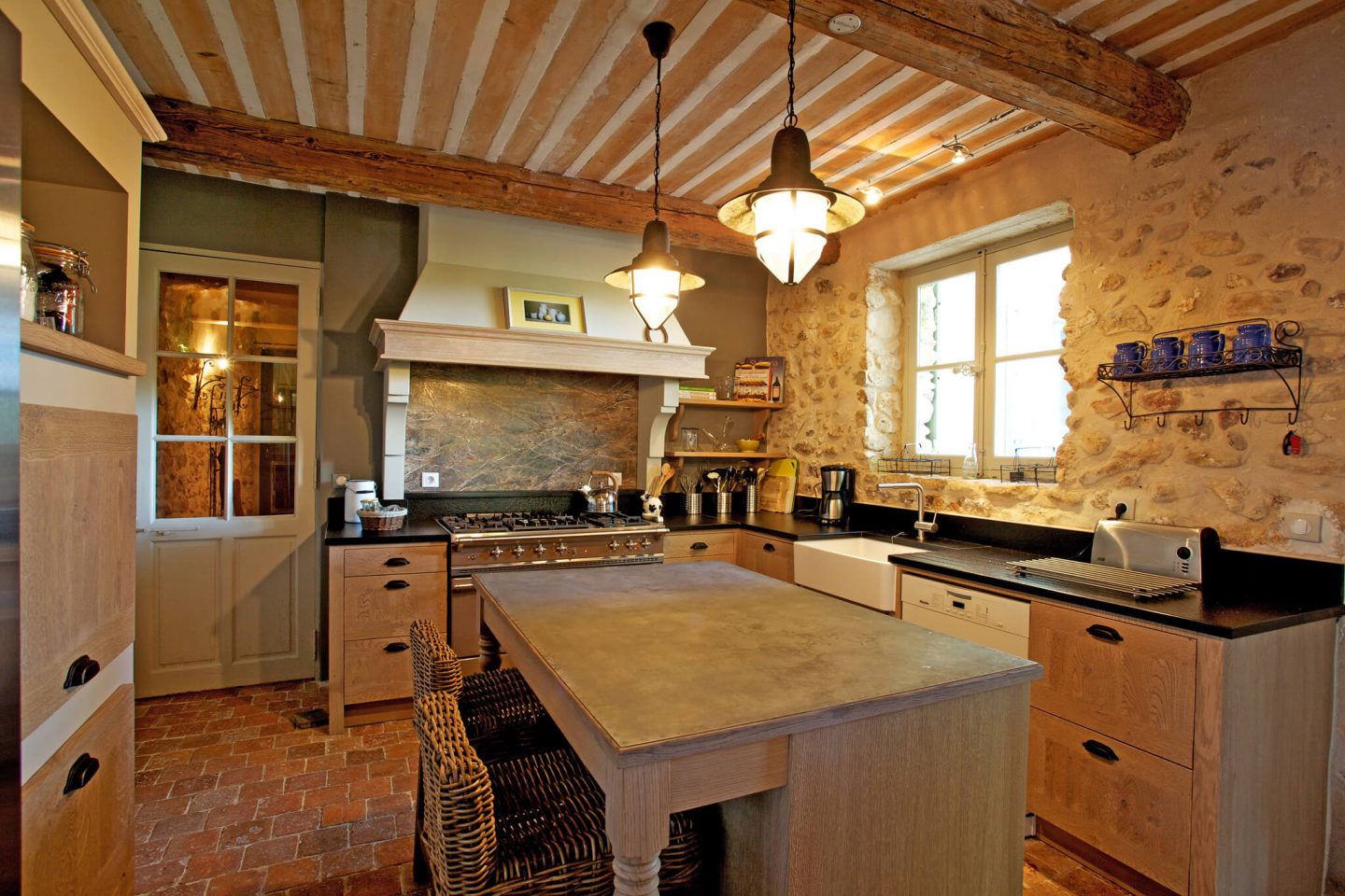 Come discover rustic elegance, ancient stone, and beautiful rugged beams within a Provencal villa - then stay for the paint color and decor Ideas! #frenchcountry #oldworld #interiordesign #provence