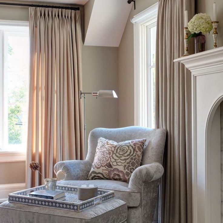 Elegant vignete with chair near fireplace. Beautiful interior design inspiration from Chicago designer Cari Giannoulias on Hello Lovely Studio. #hellolovelystudio #interiordesign #carigiannoulias #chicagodesigner #interiordesigner #sophisticateddecor #understated #luxurydecor