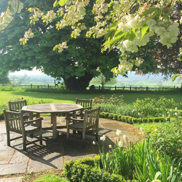 Beautiful English cottage gardens. #garden #outdoordining #englishcountry #countrygarden