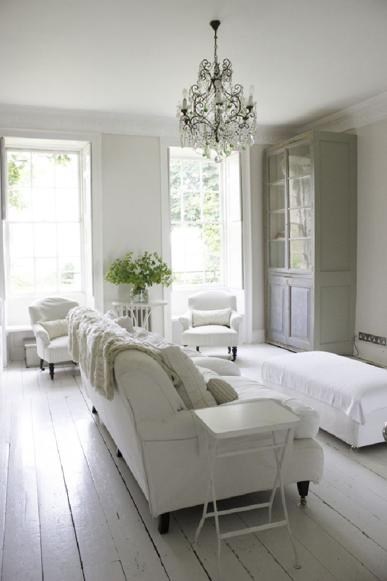 All white decor and vintage European country style in an old English countryside cottage. #whitedecor #englishcountry #europeancountry #interiordesign #oldworld #shabbychic #vintagestyle