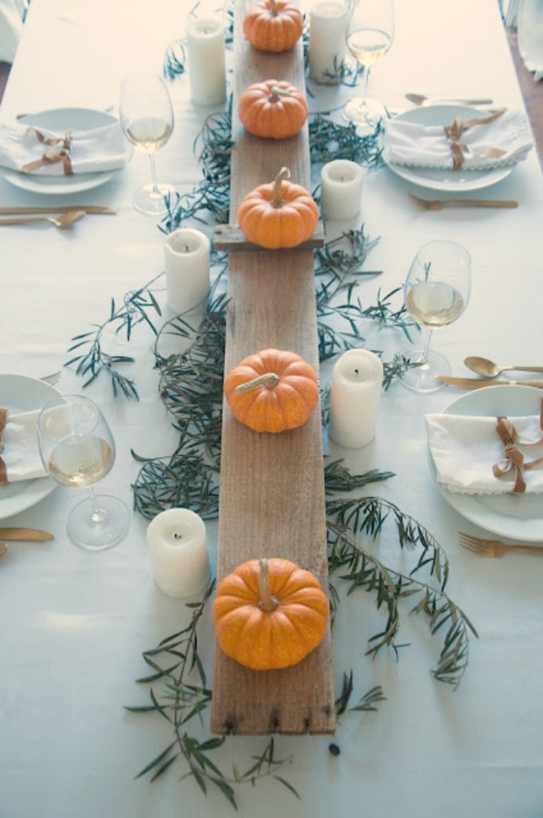 Let's consider inspiring decor ideas for a fall tablescape, pumpkin centerpieces, and painted Cinderella pumpkins. Leslie of Gwen Moss blog shares beautiful autumn DIYs and placesetting ideas on Hello Lovely. #hellolovelystudio #fallinspiration #gwenmoss #tablescape #falltable #falldiy #pumpkins #decoratingideas