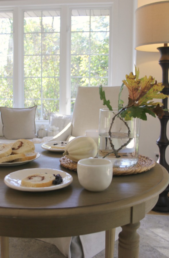 Pastel and white fall decor in my kitchen which has a relaxed, European country and shabby chic vibe. See more of it on my blog Hello Lovely where you'll see my style is serene and peaceful. #hellolovelystudio #falldecor #pastels #serenedecor #whitedecor #europeancountry #farmhousestyle #frenchfarmhouse #pumpkins