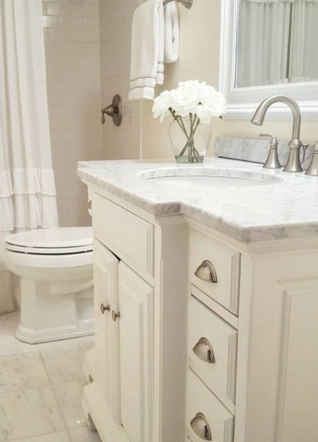 Beautiful bathroom design by The French Nest Co Interior Design. #frenchcountry #interiordesign #bathroomdesign #whitebathroom