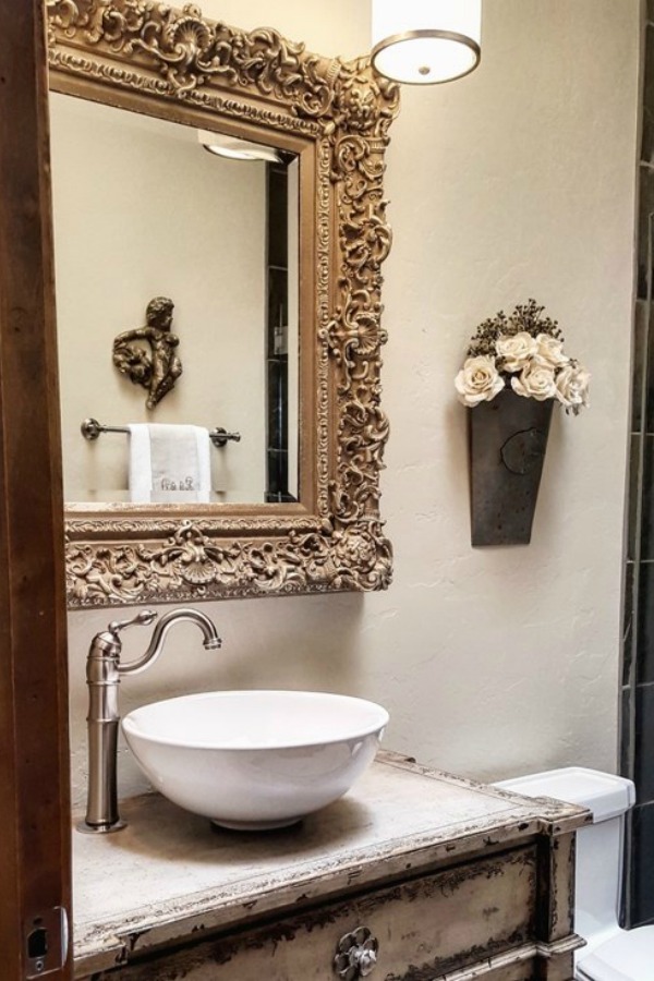 Rustic elegant French country bathroom desing with vessel sink and antique vanity - The French Nest Co Interior Design. #frenchfarmhouse #bathroom #rusticelegance