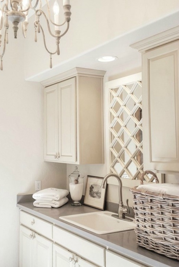 Quiet muted color story in a French country laundry room designed by The French Next. Come enjoy more Dreamy Laundry Room Inspiration to Re-imagine a Timeless Tranquil Design!