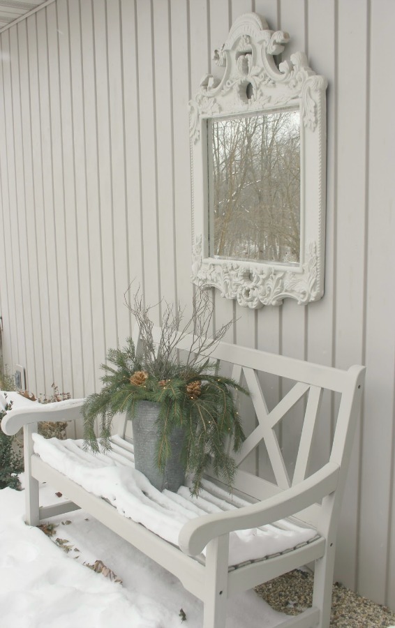 Simple Christmas decor outside in the French inspired courtyard. Hello Lovely Studio.