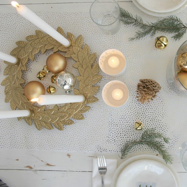 Gold advent wreath and rustic farmhouse tablescape by Hello Lovely Studio.