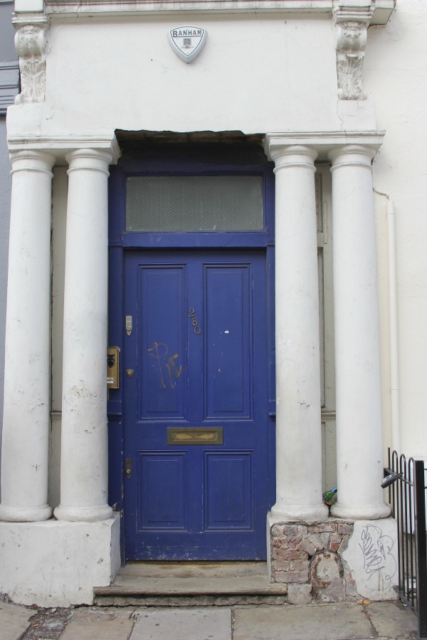 Blue door to the famed Notting Hill movie apartment flat of Hugh Grant's character. 280 Westbourne in Notting Hill. Photo by Hello Lovely Studio.