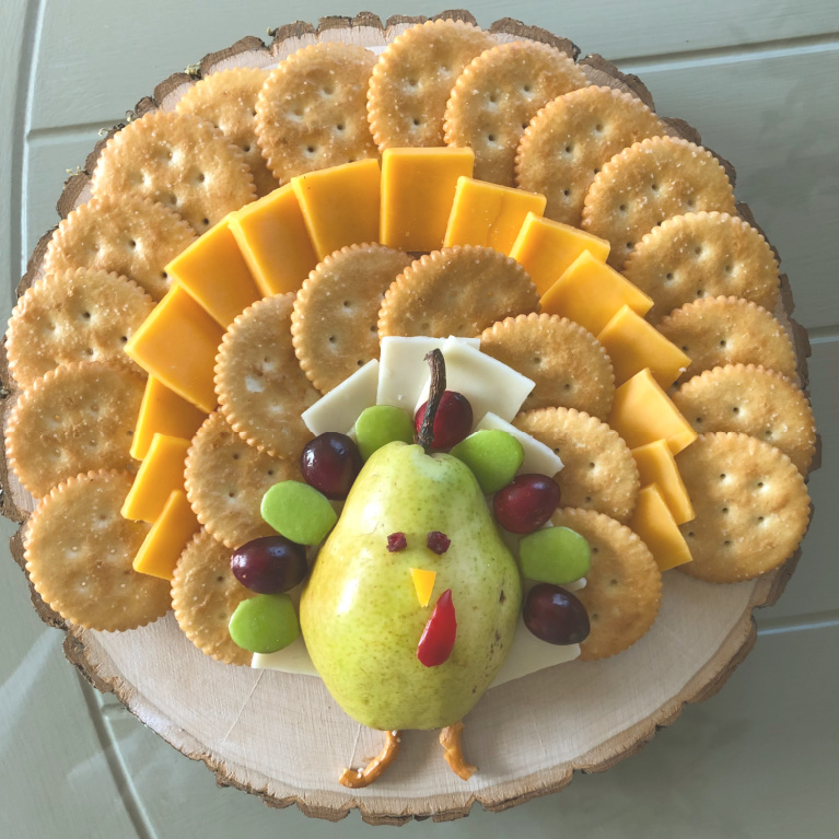 This cheese platter with pear shaped turkey was inspired by the one I saw on Itsalwaysautumn, and mine is a smaller simpler version - Hello Lovely Studio. #thanksgivingrecipes #cheeseboard #cuteappetizer #appetizerideas