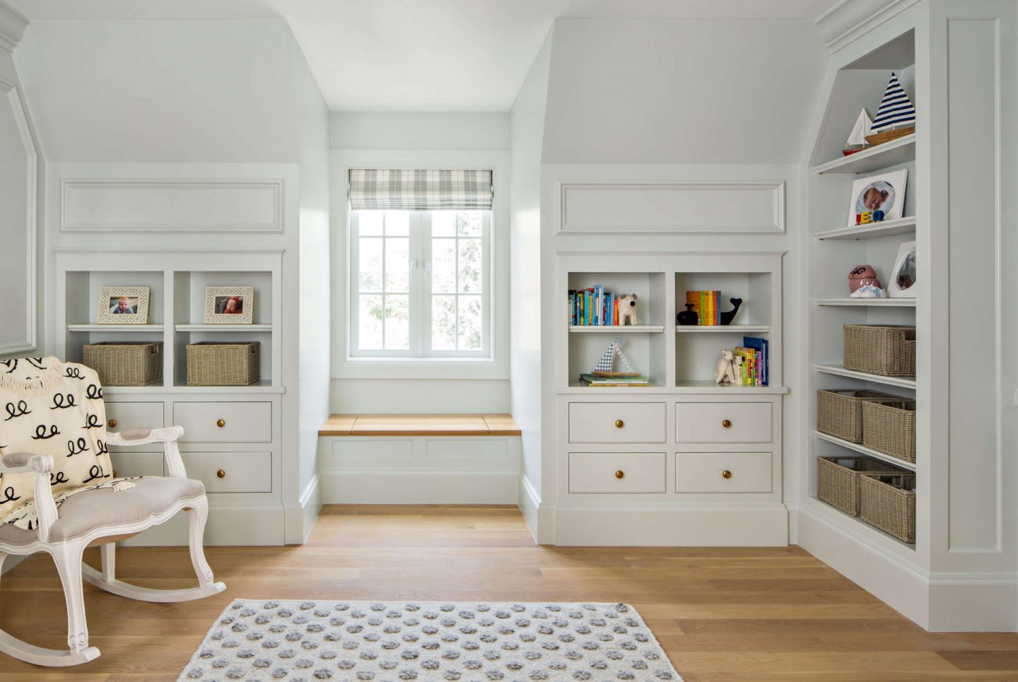 Built in cabinetry in a traditional style nursery. #thefoxgroup #nursery #traditional #builtins