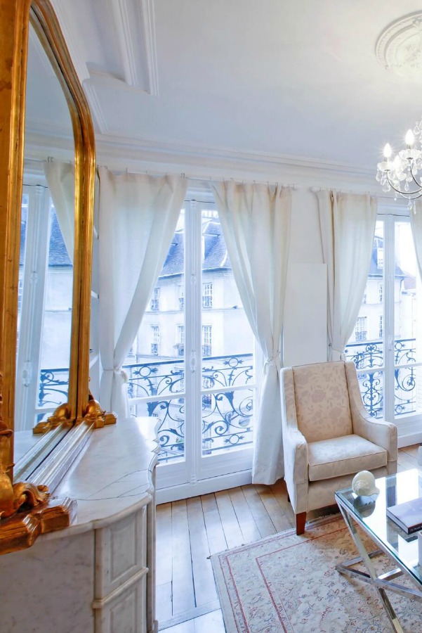 Paris apartment interior design inspiration and decorating ideas if you love a Nordic French romantic and slightly shabby chic look. #hellolovelystudio #parisapartment #interiordesign #decoratingideas #romantcdecor #chic #frenchhome