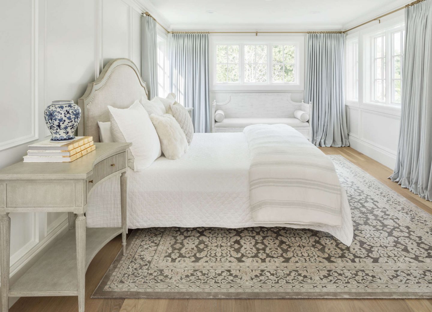 Gorgeous serene bedroom with quiet colors and beautiful paneled walls. #thefoxgroup #bedroom #interiordesign