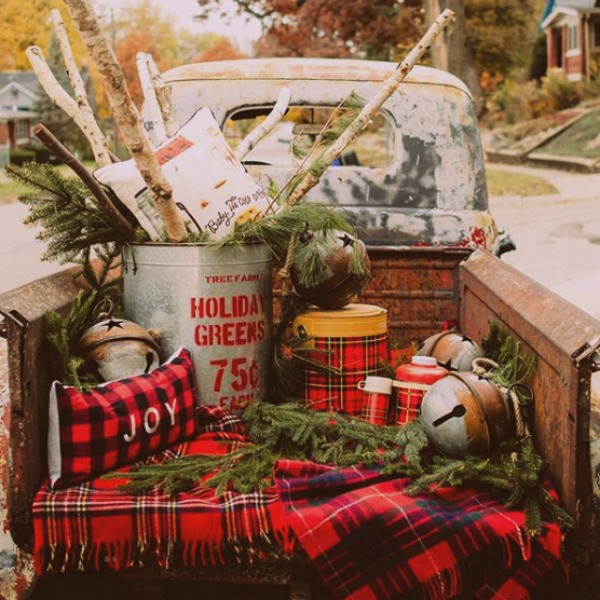 Vintage pickup truck at Urban Farmgirl with farmhouse Christmas plaids, checks, and bells! #holidaydecor #farmhouseChristmas #christmasdecor #urbanfarmgirl #truck