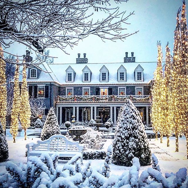 Snow covered grand traditional house exterior with gabled dormers. This example of classic traditional architecture from The Fox Group will inspire your design plans! Come see more lovely interior design and home construction ideas. #architecture #interiordesign #traditional #classic #thefoxgroup