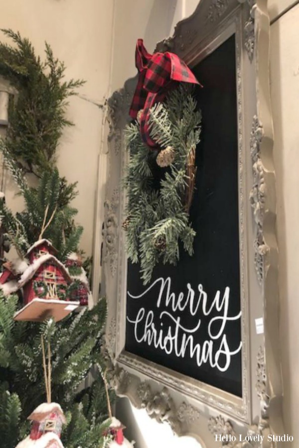 Vintage frame with a Christmas wreath and pretty ribbon is a super easy DIY holiday craft anyone can do - Hello Lovely Studio. CLICK OVER to find Christmas Decor DIY Ideas to Get Crafting for the Holidays Right Now as well as Decorating ideas!