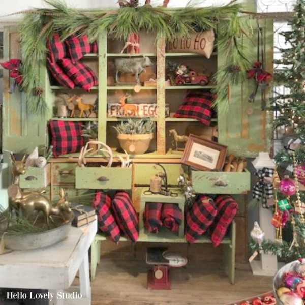 Vintage country cupboard painted sage green and decorated with red and black buffalo checks. Trove Vintage. Christmas Decor Inspiration To Pin With 34 Simple, Festive Ideas to Deck the Halls as well as Inspiring Christmas Quotes.