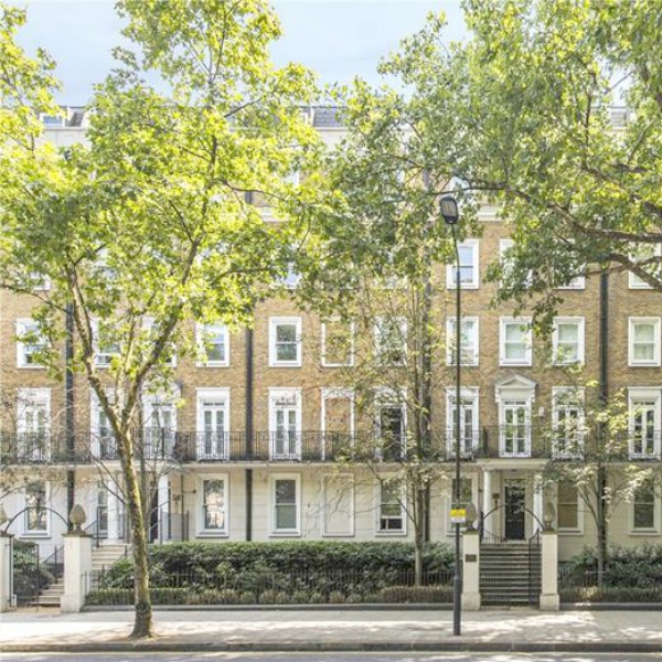 Beautiful brick exterior of Holland Park apartment building.