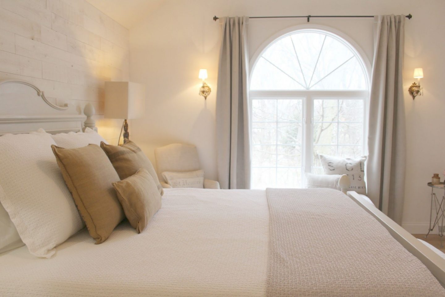 My serene Nordic French style bedroom with Benjamin Moore White walls and Stikwood accent wall. Hello Lovely Studio.