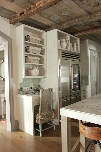 Rugged rustic wood ceiling in a timeless European country and modern French kitchen by Desiree Ashworth of Beljar Home. #frenchkitchens #timelesskitchens