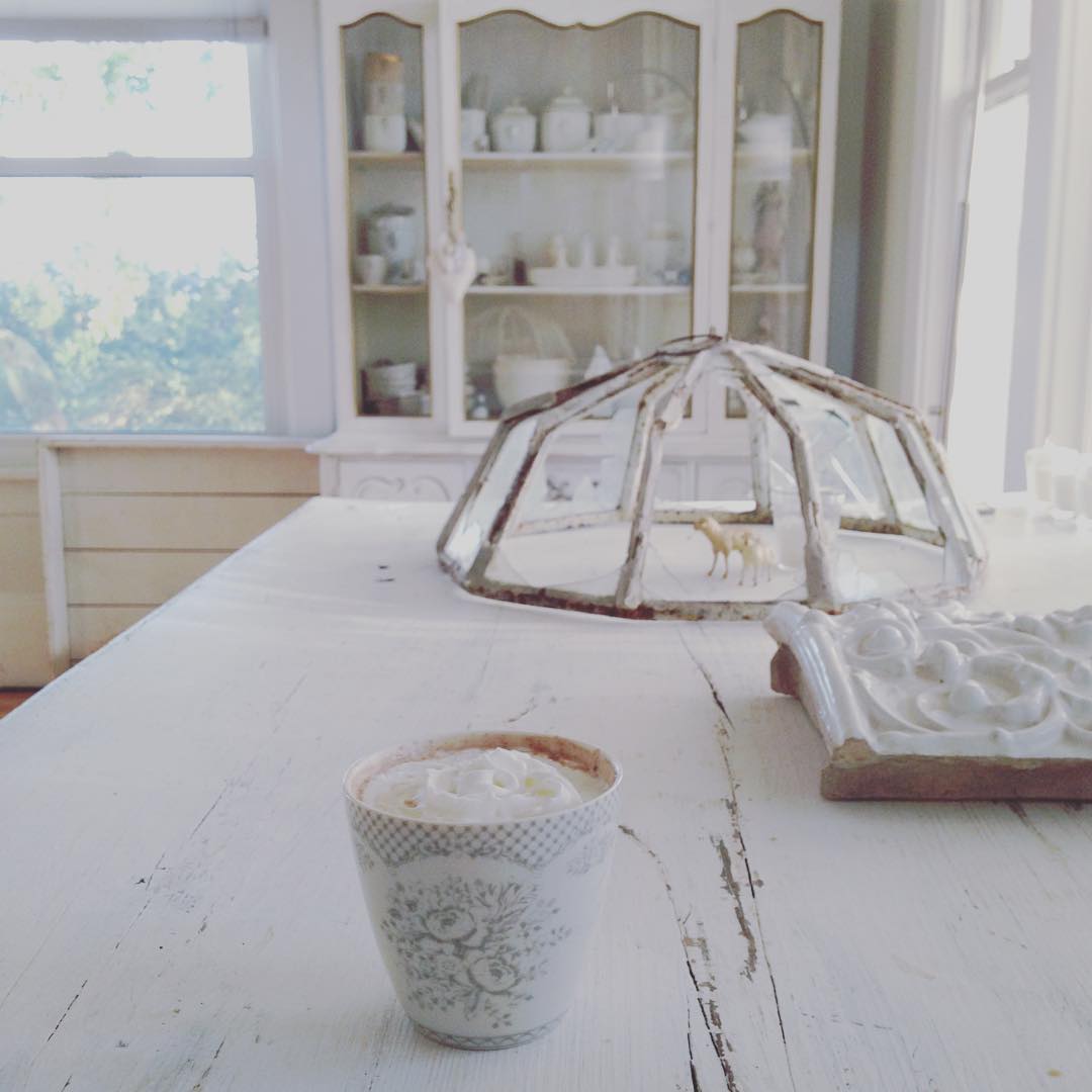 Nordic French farmhouse style kitchen with white decor, antiques, and shabby chic style by My Petite Maison.