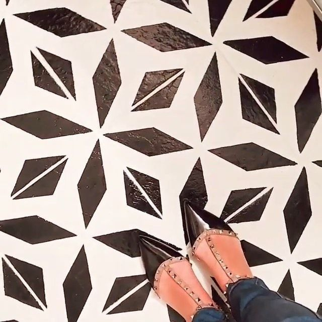 Black and white cement tile stenciled bathroom floor by @a.moroccanspinkandgold.dream. #cementtilestencil #tilestencil #stenciledfloor