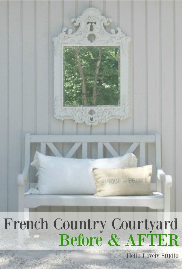 French country courtyard with stone walls, pea gravel, boxwood, lavender, wood furniture, and vintage touches. Come see the before and after of our project on Hello Lovely Studio. #hellolovelystudio #frenchcountry #courtyard #gardeninspiration #renovation