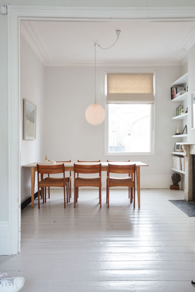 All white decor with simplicity, rustic design elements, and understated simplicity in a London Home offered by The Beach Studios. #whitedecor #housetour #simpledecor #interiordesign #vintagestyle #shabbychic