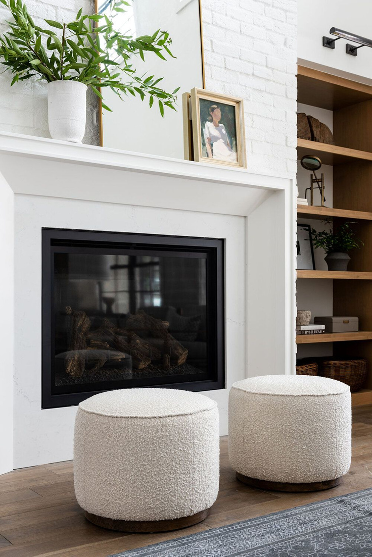 Modern rustic great room with white painted brick chimney, natural wood accents, and warm laid back style. #studiomcgee #livingroom #greatroom #beckhamproject #modernrustic