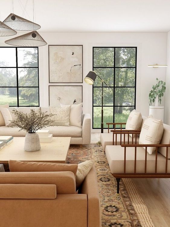 Warm modern rustic living room with soft neutrals and steel windows - Sabina Interiors. #modernrustic #livingrooms #modernluxe