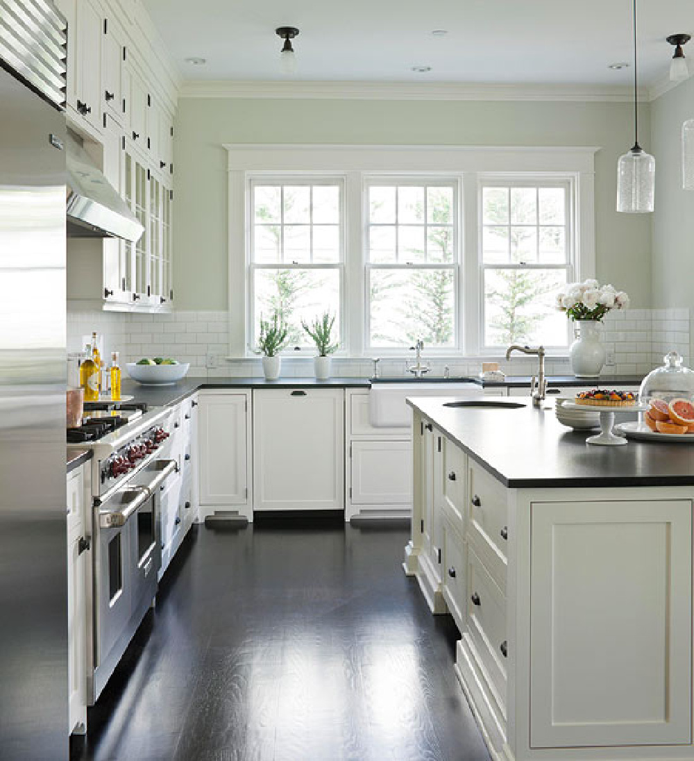 Seattle kitchen inspired by Something's Gotta Give kitchen in a Hamptons beach house with its white Shaker cabinets, black soapstone counters, stainless appliances, subway tile and classic coastal style! Get ideas for your own kitchen in this kitchen inspiration post! #kitchendesign #somethingsgottagive #coastalgrandmother