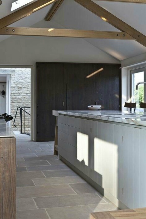 Bespoke kitchen design with urban rustic style in Cotswolds, Gloucesterhshire by Artichoke. Distressed oak, stainless steel, and Calacatta Oro marble star in the design ingredients.