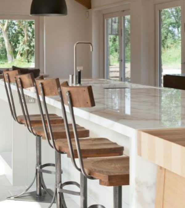 Bespoke kitchen design with urban rustic style in Cotswolds, Gloucesterhshire by Artichoke. Distressed oak, stainless steel, and Calacatta Oro marble star in the design ingredients.