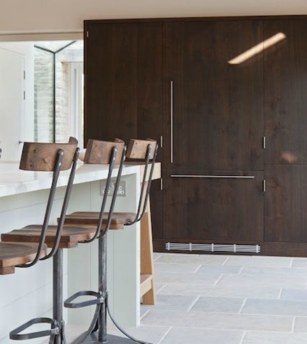 Bespoke kitchen design with urban rustic style in Cotswolds, Gloucesterhshire by Artichoke. Distressed oak, stainless steel, and Calacatta Oro marble star in the design ingredients.