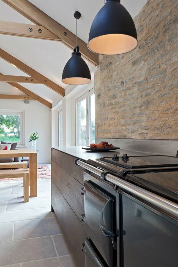 Bespoke kitchen design with urban rustic style in Cotswolds, Gloucesterhshire by Artichoke. Distressed oak, stainless steel, and Calacatta Oro marble star in the design ingredients.