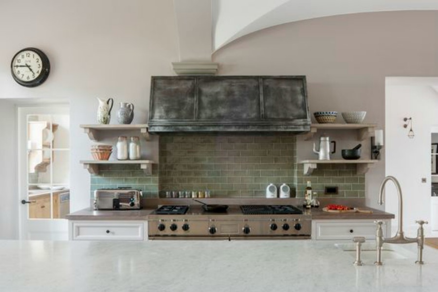 Luxurious bespoke kitchen design by Artichoke for a Tuscan villa. The primary ingredients include hand-painted tulipwood, rift cut French oak, chestnut, and acid etched zinc.