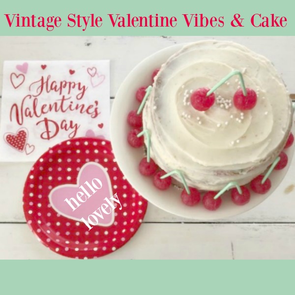 Vintage Valentine Decorations & Layer Cake. Come find simple inspiration for EASY, old fashioned, heart and love themed ideas like this simple layer cake with cherry lollipops and vintage cards on Hello Lovely Studio. #valentinesday #decorations #tablescape #layercake #vintagevalentinecards