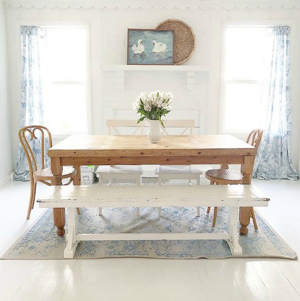 Soft blue and white accents in a modern farmhouse dining room.