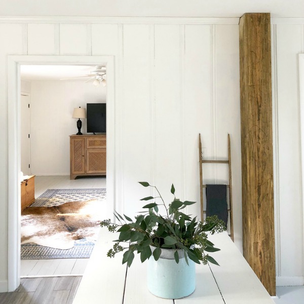 Board and batten wall treatment in modern farmhouse style room.